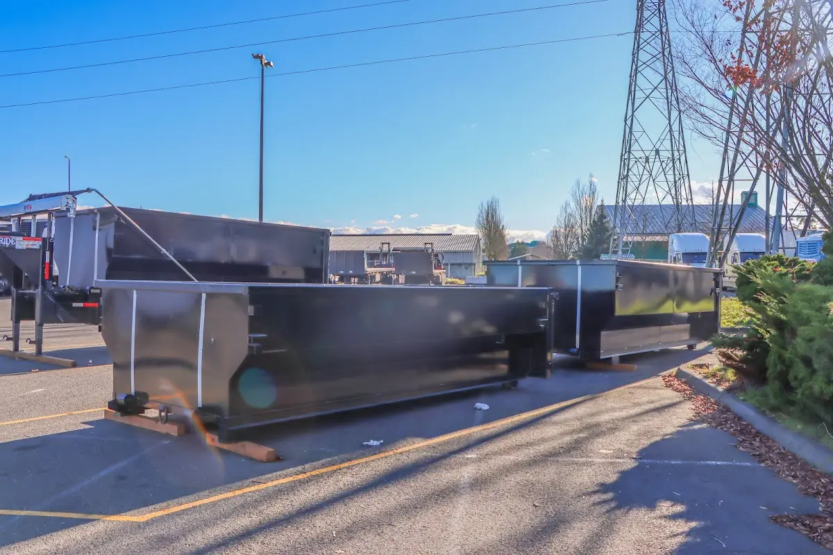 Roll-off dumpster ready for waste disposal at job site for 12 Yard Dumpster Rental in Milledgeville